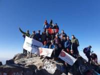Chris Henry and the team of trekkers at the summit of Mount Toubkal