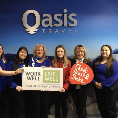 Oasis Travel Rebecca Hawkins Workplace Health and Wellbeing Co ordinator at Northern Ireland Chest Heart Stroke with staff from Oasis Travel